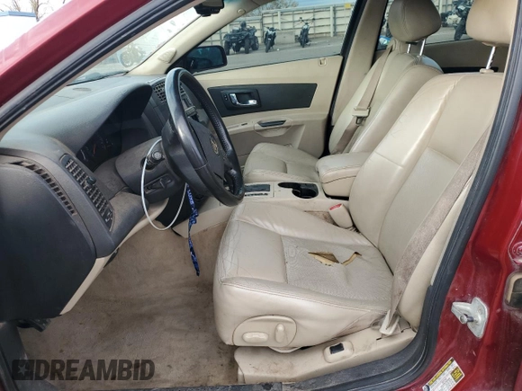 2004 Cadillac CTS with VIN 1G6DM577840132566, listed as a Copart auction lot 82704214 with 150,772 mi miles and Salvage Title. Bid and sale history available at DreamBid. Image 7.