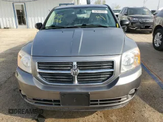 2011 Dodge Caliber Heat z VIN 1B3CB5HA4BD222393, wystawiony jako Copart lot #52901255 z przebiegiem 108 070 mil mil oraz Szkody całkowita. Historia ofert i sprzedaży dostępna na DreamBid. Obrazek 5.