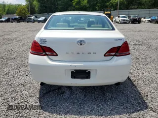 2010 Toyota Avalon XL with VIN 4T1BK3DB8AU370179, listed as a Copart auction lot 54670015 with 186,192 mi miles and Salvage Title. Bid and sale history available at DreamBid. Image 6.