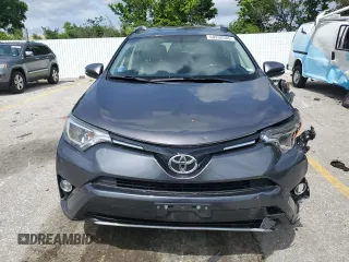 2016 Toyota RAV4 XLE with VIN JTMRFREV6GJ099720, listed as a Copart auction lot 60200585 with 148,801 mi miles and Salvage title. Bid and sale history available at DreamBid. Image 5.