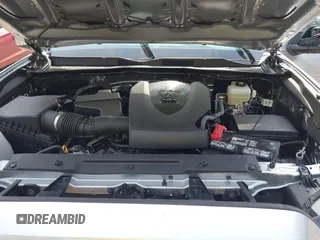 2022 Toyota Tacoma SR with VIN 3TMCZ5ANXNM497511, listed as a IAAI auction lot 41670710 with 26,277 mi miles and . Bid and sale history available at DreamBid. Image 10.