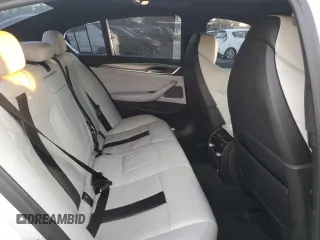 2019 BMW M5 z VIN WBSJF0C53KB284878, wystawiony jako Copart lot #86763564 z przebiegiem Nie podano mil oraz Szkoda całkowita • Salvage title. Historia ofert i sprzedaży dostępna na DreamBid. Obrazek 10.
