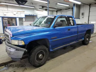 1999 Dodge Ram 2500 with VIN 1B7KF2363XJ608134, listed as a Copart auction lot 85928784 with 199,243 mi miles and Salvage Title. Bid and sale history available at carsss.com. Image 1.