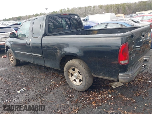 2002 Ford F-150 XL with VIN 1FTRX17252NA19861, listed as a IAAI auction lot 41304648 with 279,277 mi miles. Bid and sale history available at carsss.com. Image 3.