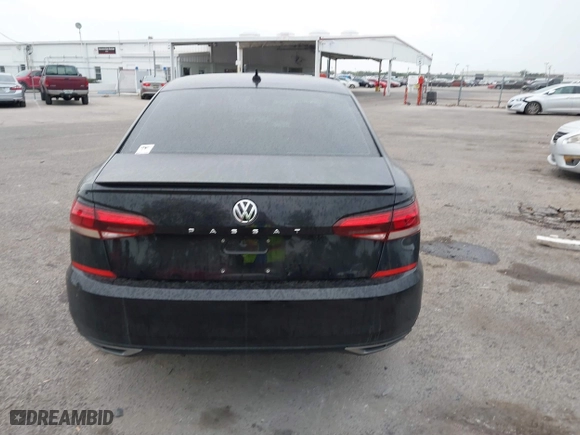 2021 Volkswagen Passat 2.0T R-Line with VIN 1VWMA7A33MC015058, listed as a IAAI auction lot 41621793 with 63,190 mi miles. Bid and sale history available at carsss.com. Image 16.