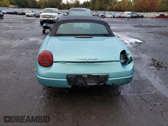 2002 Ford Thunderbird Hardtop Premium with VIN 1FAHP60A02Y121714, listed as a Copart auction lot 77852994 with 132,049 mi miles and Salvage Title. Bid and sale history available at DreamBid. Image 6.
