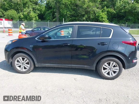 2017 Kia Sportage LX z VIN KNDPMCAC1H7285906, wystawiony jako IAAI lot #42399031 z przebiegiem 142 909 mil mil oraz . Historia ofert i sprzedaży dostępna na DreamBid. Obrazek 14.