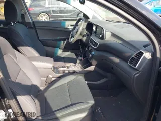 2019 Hyundai Tucson Value with VIN KM8J3CA41KU066384, listed as a IAAI auction lot 41524315 with 52,903 mi miles. Bid and sale history available at carsss.com. Image 5.