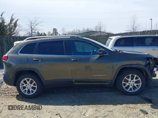 2014 Jeep Cherokee Latitude with VIN 1C4PJMCS5EW201462, listed as a IAAI auction lot 41727379 with 170,958 mi miles and . Bid and sale history available at DreamBid. Image 14.