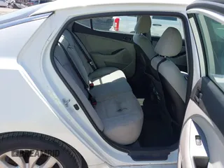 2015 Kia Optima LX with VIN 5XXGM4A76FG443962, listed as a IAAI auction lot 42069701 with 101,516 mi miles. Bid and sale history available at carsss.com. Image 8.