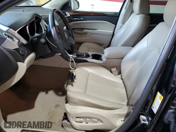 2012 Cadillac SRX Performance Collection with VIN 3GYFNEE3XCS593868, listed as a Copart auction lot 54381275 with 80,855 mi miles and Salvage title. Bid and sale history available at DreamBid. Image 7.