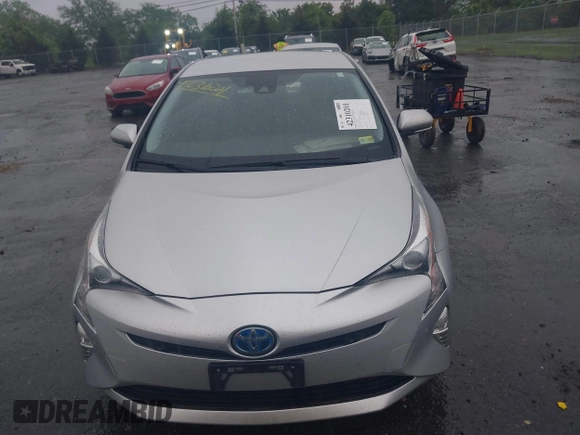 2017 Toyota Prius Two with VIN JTDKARFU4H3043433, listed as a IAAI auction lot 42310201 with 50,715 mi miles and . Bid and sale history available at DreamBid. Image 12.