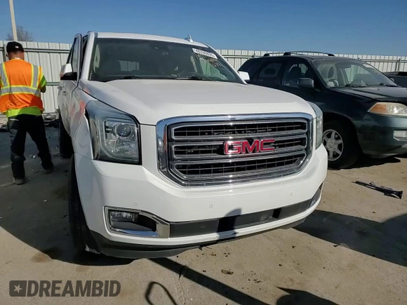 2015 GMC Yukon SLT z VIN 1GKS2BKC9FR539411, wystawiony jako Copart lot #48336835 z przebiegiem 176 994 mil mil oraz Szkoda całkowita • Salvage title. Historia ofert i sprzedaży dostępna na DreamBid. Obrazek 12.