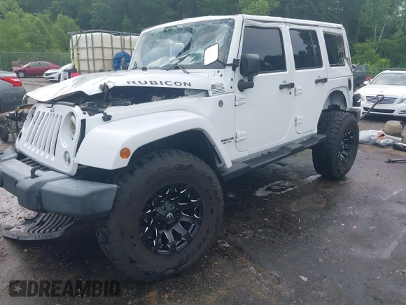 2016 Jeep Wrangler Unlimited Rubicon Hard Rock with VIN 1C4BJWFG3GL228449, listed as a IAAI auction lot 42158318 with Not provided miles and . Bid and sale history available at DreamBid. Image 2.