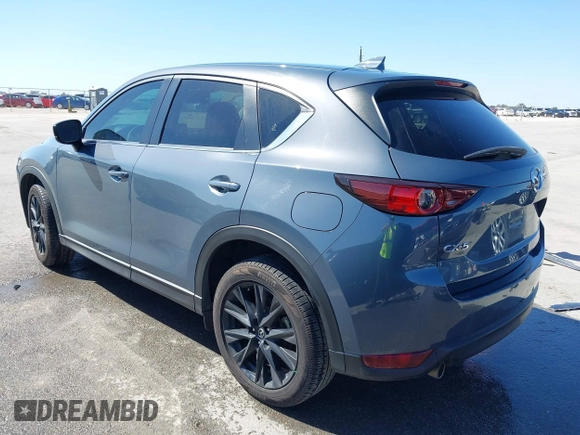 2021 Mazda CX-5 Touring with VIN JM3KFACM1M0317763, listed as a IAAI auction lot 41775712 with 75,068 mi miles. Bid and sale history available at carsss.com. Image 3.