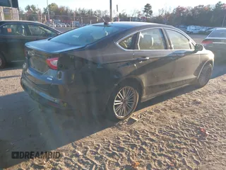 2015 Ford Fusion SE with VIN 3FA6P0HD1FR255395, listed as a IAAI auction lot 40782090 with 132,579 mi miles and . Bid and sale history available at DreamBid. Image 4.
