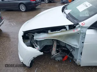 2023 Tesla Model Y Performance with VIN 7SAYGDEF7PF807312, listed as a IAAI auction lot 41711068 with 25,029 mi miles and . Bid and sale history available at DreamBid. Image 6.
