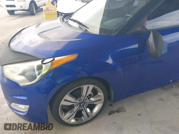 2012 Hyundai Veloster w/Gray Int z VIN KMHTC6AD0CU034683, wystawiony jako IAAI lot #42395112 z przebiegiem 134 388 mil mil oraz . Historia ofert i sprzedaży dostępna na DreamBid. Obrazek 12.