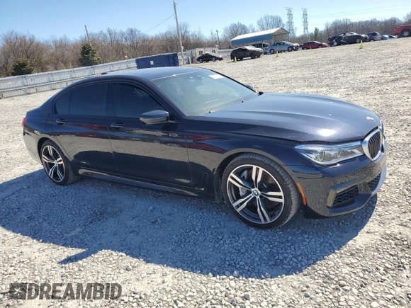 2016 BMW 7 Series 750i with VIN WBA7F0C57GGL99153, listed as a Copart auction lot 45475755 with 140,328 mi miles and Salvage title. Bid and sale history available at DreamBid. Image 4.
