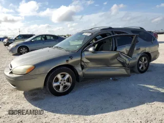 2003 Ford Taurus SE Standard with VIN 1FAFP58U33A259080, listed as a Copart auction lot 86819024 with 143,482 mi miles and Salvage Title. Bid and sale history available at carsss.com. Image 1.