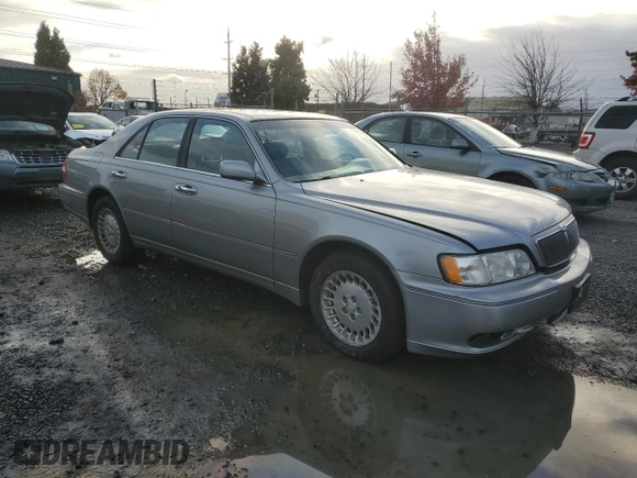 1999 Infiniti Q45 z VIN JNKBY31A3XM602869, wystawiony jako Copart lot #78799354 z przebiegiem 189 083 mil mil oraz Szkoda całkowita • Salvage title. Historia ofert i sprzedaży dostępna na DreamBid. Obrazek 4.