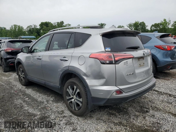 2017 Toyota RAV4 LE z VIN 2T3BFREV1HW645599, wystawiony jako Copart lot #58500105 z przebiegiem 83 266 mil mil oraz Szkoda całkowita • Salvage title. Historia ofert i sprzedaży dostępna na DreamBid. Obrazek 2.