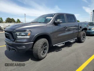 2022 Ram 1500 Rebel with VIN 1C6SRFLT3NN372313, listed as a Copart auction lot 58432665 with 25,674 mi miles and Salvage title. Bid and sale history available at DreamBid. Image 1.