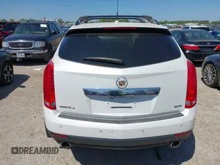 2014 Cadillac SRX Performance Collection with VIN 3GYFNFE35ES582897, listed as a IAAI auction lot 41978361 with 144,116 mi miles and . Bid and sale history available at DreamBid. Image 16.