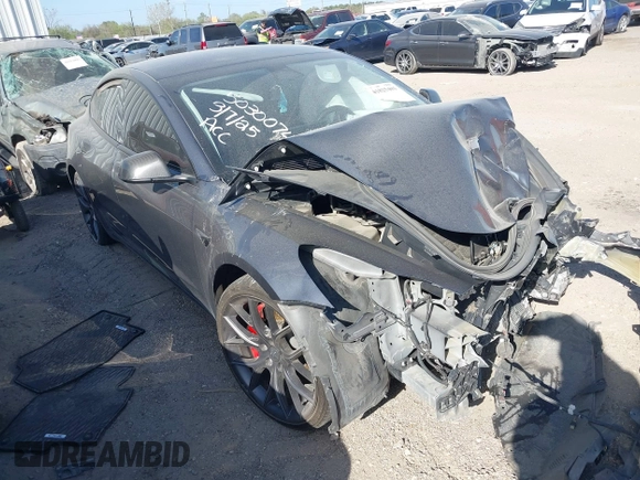 2022 Tesla Model 3 Performance with VIN 5YJ3E1EC3NF194197, listed as a IAAI auction lot 41825401 with Not Provided miles and . Bid and sale history available at DreamBid. Image 1.