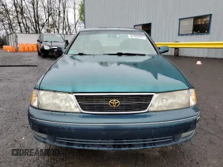1998 Toyota Avalon XL with VIN 4T1BF18B6WU242906, listed as a Copart auction lot 52385935 with 108,802 mi miles and Salvage Title. Bid and sale history available at DreamBid. Image 5.