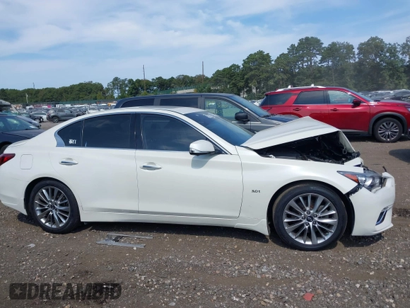 2019 Infiniti Q50 Luxe with VIN JN1EV7ARXKM557946, listed as a IAAI auction lot 40362058 with 56,615 mi miles and . Bid and sale history available at carsss.com. Image 13.