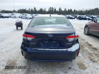 2022 Toyota Corolla Hybrid LE with VIN JTDEAMDEXNJ048722, listed as a IAAI auction lot 41383037 with 72,878 mi miles. Bid and sale history available at carsss.com. Image 16.