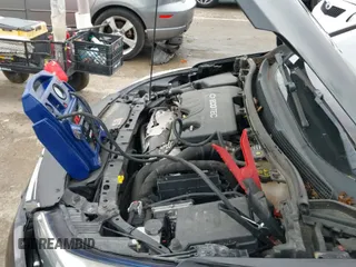 2018 Chevrolet Cruze LT z VIN 1G1BH5SE7J7189867, wystawiony jako IAAI lot #42405136 z przebiegiem 86 509 mil mil oraz . Historia ofert i sprzedaży dostępna na DreamBid. Obrazek 20.