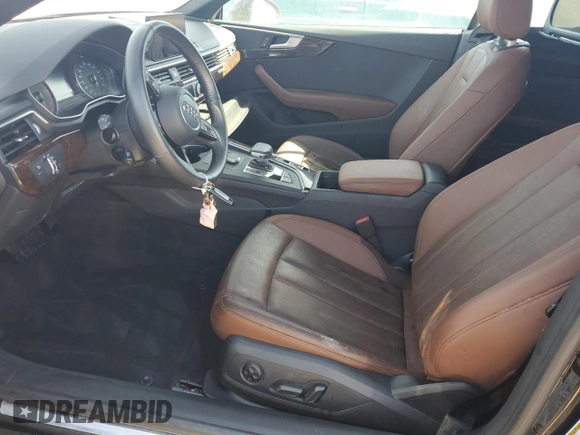 2019 Audi A5 Cabriolet Premium z VIN WAUWNGF56KN010302, wystawiony jako Copart lot #65011662 z przebiegiem Nie podano mil oraz . Historia ofert i sprzedaży dostępna na DreamBid. Obrazek 7.