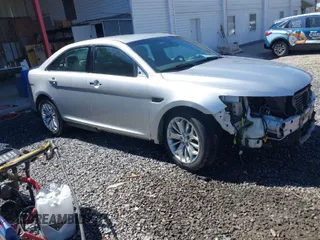 2015 Ford Taurus Limited with VIN 1FAHP2F81FG130088, listed as a IAAI auction lot 41738245 with 87,964 mi miles. Bid and sale history available at carsss.com. Image 1.