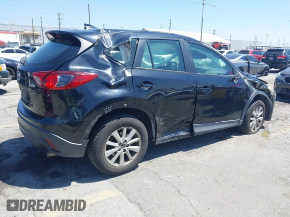 2016 Mazda CX-5 Sport with VIN JM3KE2BY4G0807776, listed as a IAAI auction lot 42206641 with 136,809 mi miles and . Bid and sale history available at DreamBid. Image 4.