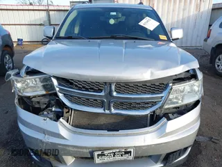 2011 Dodge Journey Crew with VIN 3D4PG3FG7BT516039, listed as a IAAI auction lot 41104532 with 132,161 mi miles and . Bid and sale history available at DreamBid. Image 12.