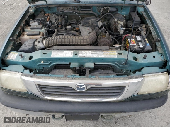 1999 Mazda B-Series Truck SE with VIN 4F4ZR17X5XTM25588, listed as a Copart auction lot 53667315 with 104,025 mi miles and Clean Title. Bid and sale history available at DreamBid. Image 11.