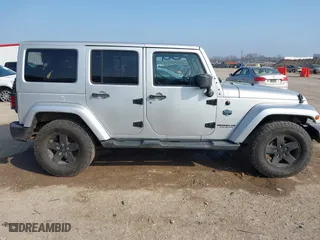 2012 Jeep Wrangler Unlimited Sahara with VIN 1C4HJWEG9CL146750, listed as a IAAI auction lot 41512678 with 94,952 mi miles. Bid and sale history available at carsss.com. Image 13.