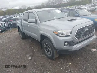 2019 Toyota Tacoma SR z VIN 3TMCZ5AN1KM206969, wystawiony jako IAAI lot #41951159 z przebiegiem 94 875 mil mil oraz . Historia ofert i sprzedaży dostępna na DreamBid. Obrazek 1.