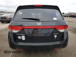 2015 Honda Odyssey Touring Elite with VIN 5FNRL5H91FB504095, listed as a Copart auction lot 53868125 with 176,272 mi miles and Salvage Title. Bid and sale history available at DreamBid. Image 6.