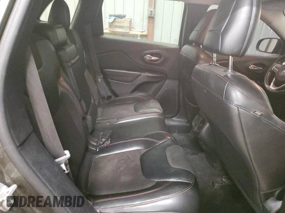 2015 Jeep Cherokee Trailhawk z VIN 1C4PJMBS8FW665607, wystawiony jako Copart lot #51536715 z przebiegiem 166 443 mil mil oraz Szkoda całkowita • Salvage title. Historia ofert i sprzedaży dostępna na DreamBid. Obrazek 11.