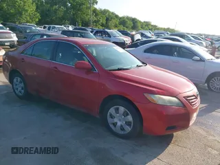 2007 Toyota Camry CE with VIN 4T1BE46K37U106127, listed as a IAAI auction lot 42088929 with 241,810 mi miles. Bid and sale history available at carsss.com. Image 1.