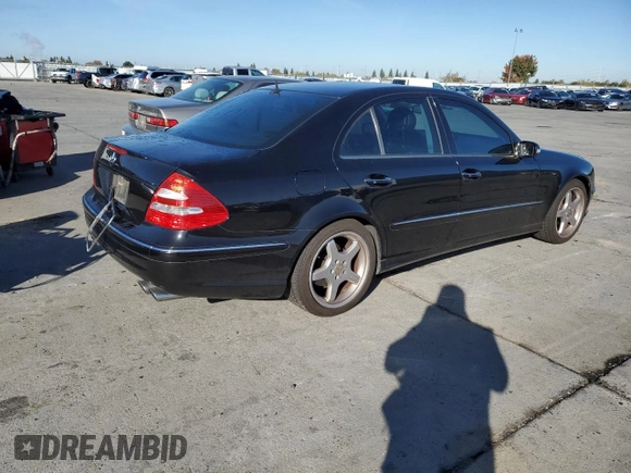 2004 Mercedes-Benz E-Class 5.0L with VIN WDBUF70J64A585084, listed as a Copart auction lot 80297124 with 233,638 mi miles and Salvage Title. Bid and sale history available at carsss.com. Image 3.