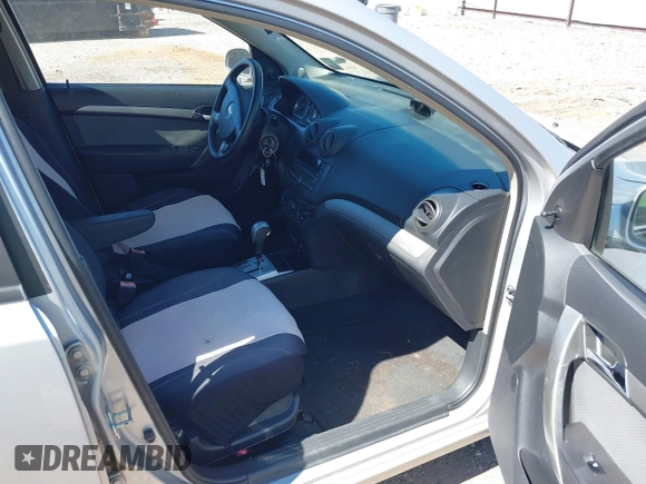 2009 Chevrolet Aveo 1LT with VIN KL1TD66E19B651119, listed as a IAAI auction lot 41648261 with 132,456 mi miles and . Bid and sale history available at DreamBid. Image 5.