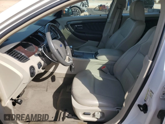 2011 Ford Taurus SEL with VIN 1FAHP2EW9BG128793, listed as a Copart auction lot 48940475 with 121,681 mi miles and Salvage Title. Bid and sale history available at DreamBid. Image 7.