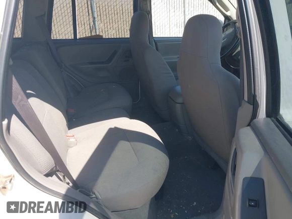 2004 Jeep Grand Cherokee Laredo with VIN 1J4GX48SX4C151160, listed as a IAAI auction lot 42765441 with 176,179 mi miles and . Bid and sale history available at DreamBid. Image 8.