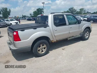 2005 Ford Explorer Sport Trac XLS z VIN 1FMZU77K15UB67801, wystawiony jako IAAI lot #42822163 z przebiegiem 179 102 mil mil oraz . Historia ofert i sprzedaży dostępna na DreamBid. Obrazek 4.