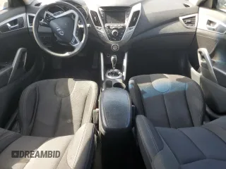 2012 Hyundai Veloster w/Black Int z VIN KMHTC6AD4CU046609, wystawiony jako Copart lot #54888045 z przebiegiem 152 997 mil mil oraz Szkoda całkowita • Salvage title. Historia ofert i sprzedaży dostępna na DreamBid. Obrazek 8.