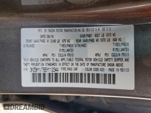 2014 Mazda 3 i Touring z VIN 3MZBM1V76EM112344, wystawiony jako Copart lot #57168785 z przebiegiem 122 826 mil mil oraz Szkoda całkowita • Salvage title. Historia ofert i sprzedaży dostępna na DreamBid. Obrazek 12.
